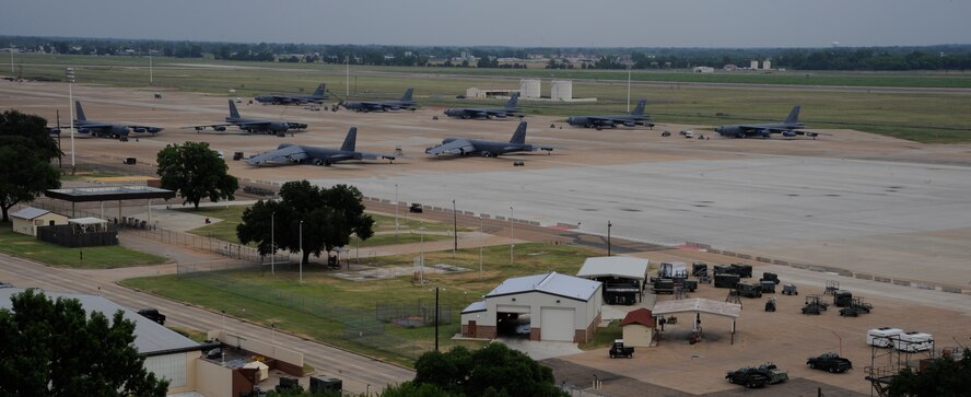 B-52H Stratofortress bombers sit on the flightline at Barksdale Air Force Base, La., July 11, 2013. Air traffic controllers guide the bombers to their parking spots on the flightline. (U.S. Air Force photo/Airman 1st Class Andrew Moua)