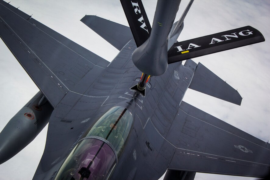 An F-16 Fighting Falcon from the 132nd Fighter Wing, Des Moines, Iowa, recieves fuel from a KC-135 Stratotanker of the 185th Air Refueling Wing, Sioux City, Iowa, in the skies over western Iowa on June 21, 2013. (U.S. Air National Guard photo by Senior Airman Dustin M. Smart/Released)