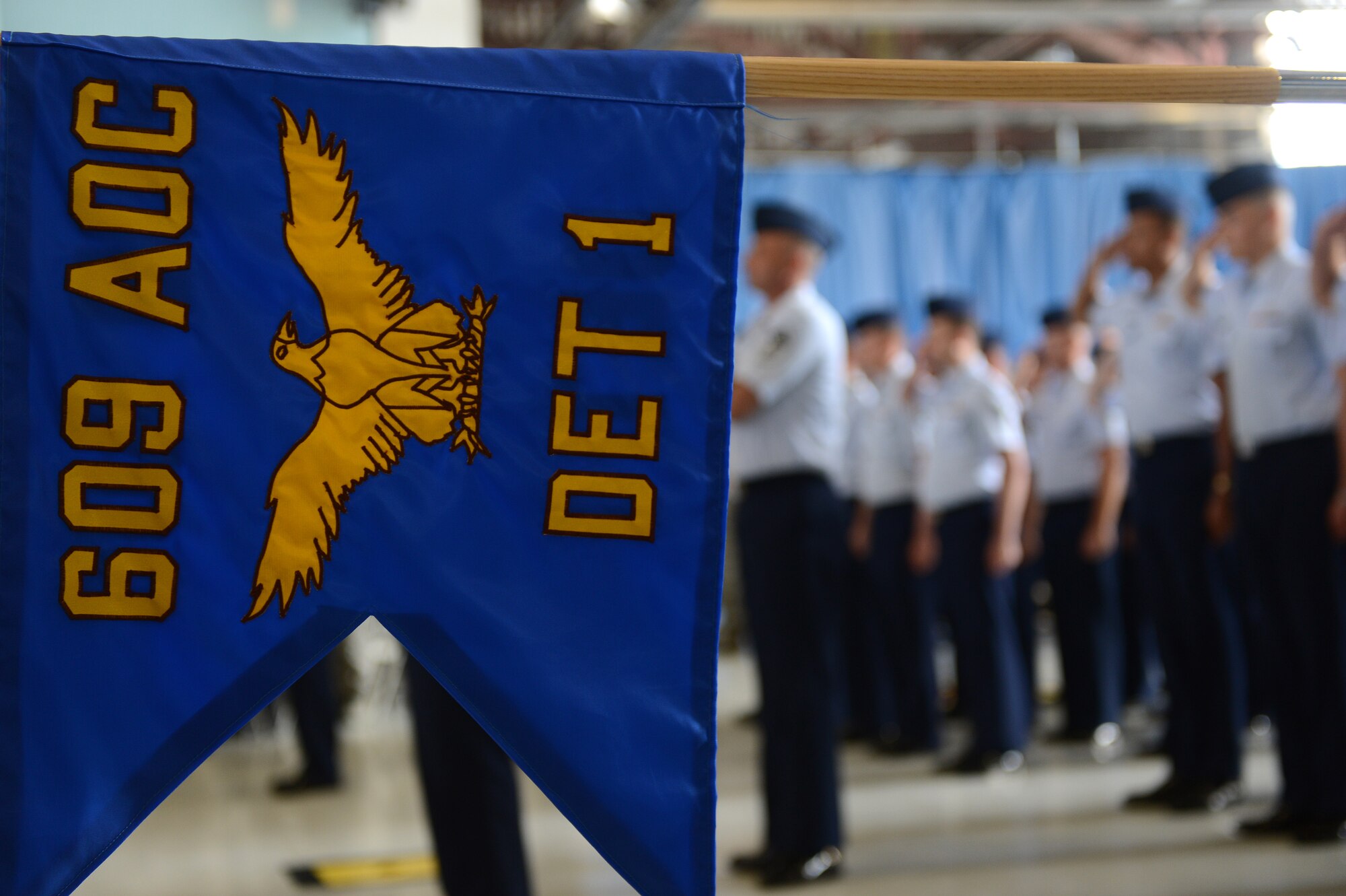 Members of the 609th Air and Space Operations Detachment 1, Air Forces Central Command’s 609th Air Communications Squadron and the 28th Operational Weather Squadron stand in formation ready to render ceremonial customs and courtesies during the AFECENT change of command ceremony at Shaw Air Force Base, S.C., July 11, 2013. Taking command is Lt. Gen. John W. Hesterman. (U.S. Air Force photo by Airman 1st Class Daniel Blackwell/Released)