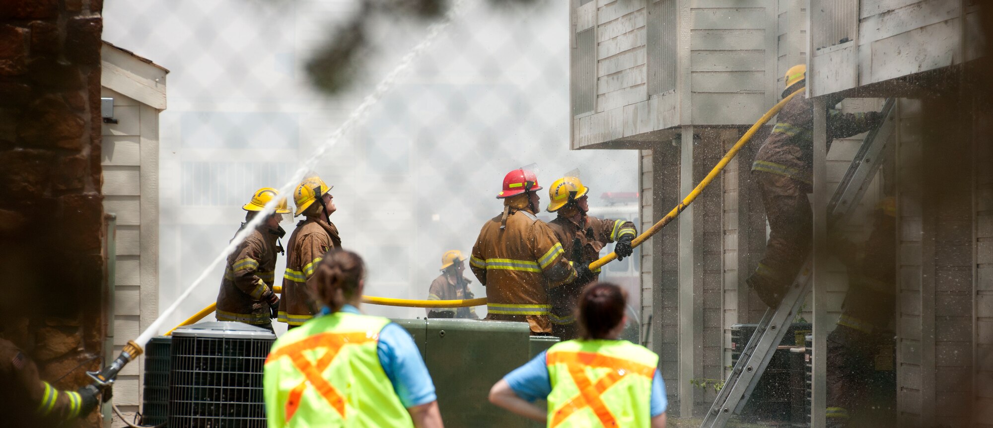 ALTUS, Okla. – Firefighters work to extinguish a fire at Apple Creek Apartments, July 8.  Firefighters from the City of Altus, Altus Air Force Base, Blair and Friendship assisted in putting out the fire that erupted in the living quarters. (U.S. Air Force photo by Senior Airman Jesse Lopez / Released)