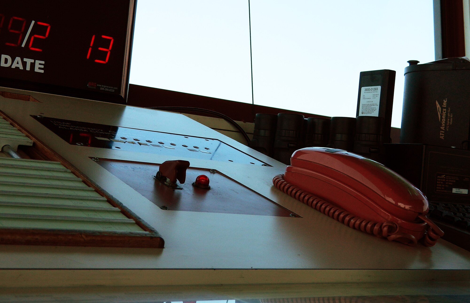 ROYAL AIR FORCE LAKENHEATH, England – Air traffic controllers of the 48th Fighter Wing have direct access to the red “crash phone” network for use during any in-flight emergency. The network allows instantaneous communication between all emergency responders including the fire department, emergency room and security forces. (U.S. Air Force photo by Elizabeth Ritsema)