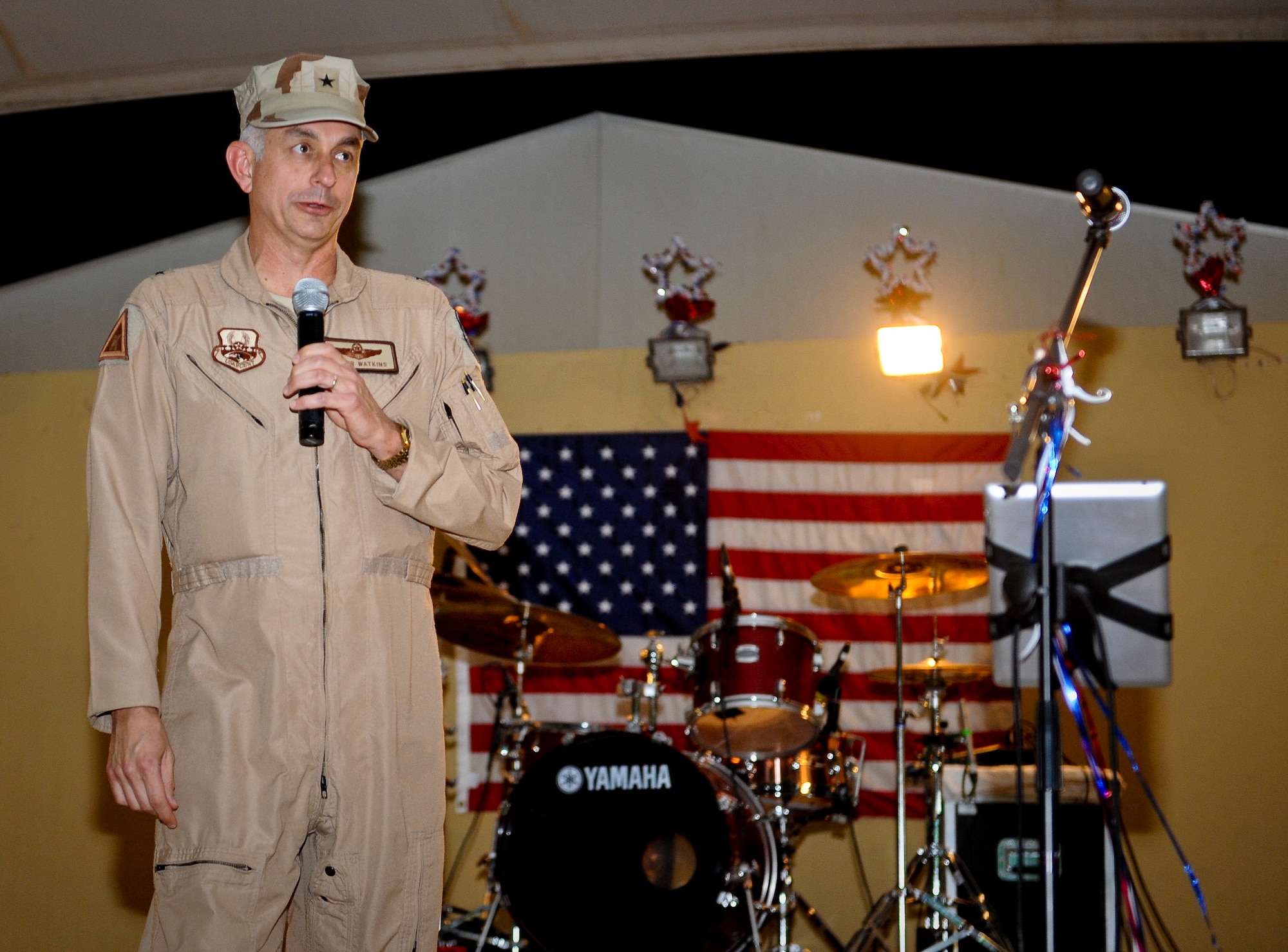 Brig. Gen. Roger Watkins addresses the 379th Air Expeditionary Wing during the July Fourth celebration at the 379th AEW in Southwest Asia, July 4, 2013. Watkins is the 379th AEW commander. (U.S. Air Force photo/Senior Airman Benjamin Stratton)