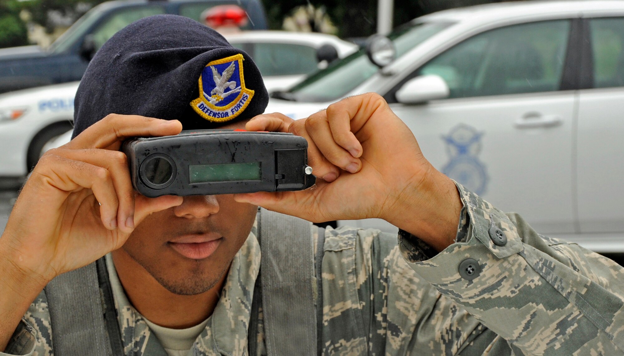 U.S. Air Force Airman 1st Class Adrian Isom, 35th Security Forces Squadron basic force protection, simulates using a Lidar to measure how fast cars are going at Misawa Air Base, Japan, July 11, 2013. If caught speeding the police take points from your license as a penalty. 33 kilometers per hour -and over the speed limit you lose 6 points and get your license revoked for a year. (U.S. Air Force photo by Airman 1st Class Kenna Jackson)