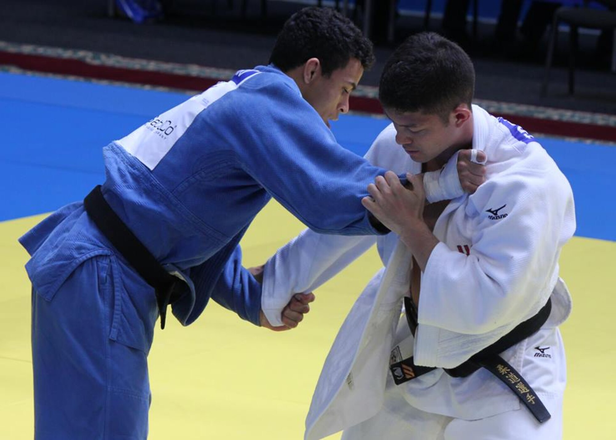 Capt. Trevor Mallo (right), from the 718th Civil Engineer Squadron, competes against
eventual Bronze medalist A. Silva from Brazil in the 73 kg division at the Conseil International Du Sport Militaire’s World Military Judo Championship in Astana, Kazakhstan, July 4. Active-duty members in all service branches from 30 countries were invited to participate in the championship from June 27 to July 7. (Courtesy photo by Claudia Berwager/Released)  