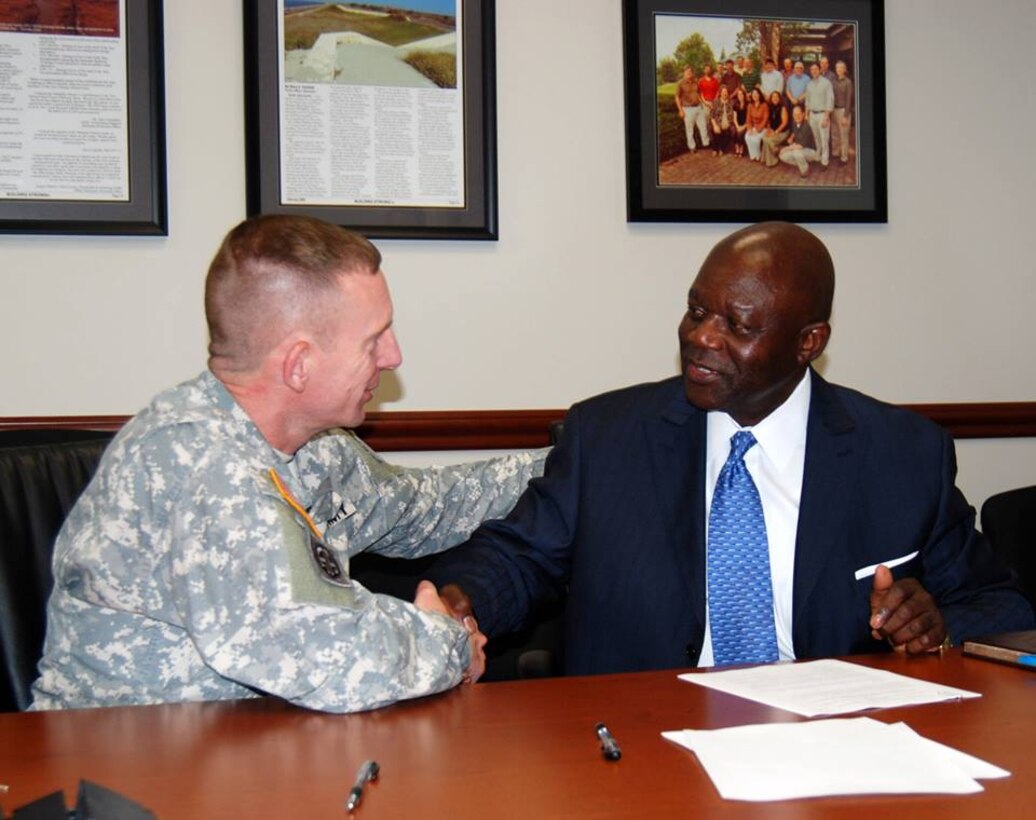 July 9, 2013: Memphis District Commander Col. Vernie Reichling (left) and International Federation of Professional and Technical Engineers (IFPTE) Local 259 President Melvin Tate (right) signed a Labor Forum Agreement today at the District Headquarters. In the works for more than a year, the agreement between IFPTE and the Memphis District will establish and maintain a cooperative, constructive working relationship which will provide a better quality of work life for employees, more efficient administration of District programs, and above all, better service for the District’s customers. The forum will meet quarterly and will include IFPTE bargaining unit employees and District management.