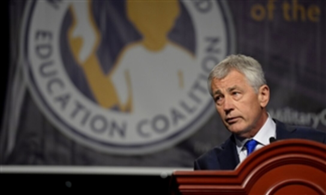 Secretary of Defense Chuck Hagel addresses the audience at the Military Child Education Coalition Training Seminar in the Gaylord National Hotel & Convention Center at National Harbor, Md., on July 9, 2013.  Hagel announced that the department has selected the first round of schools that will receive DoD educational partnership grants for the upcoming school year.  A total of nearly $20 million will go to 15 public school districts that serve 23 military installations across the country.  