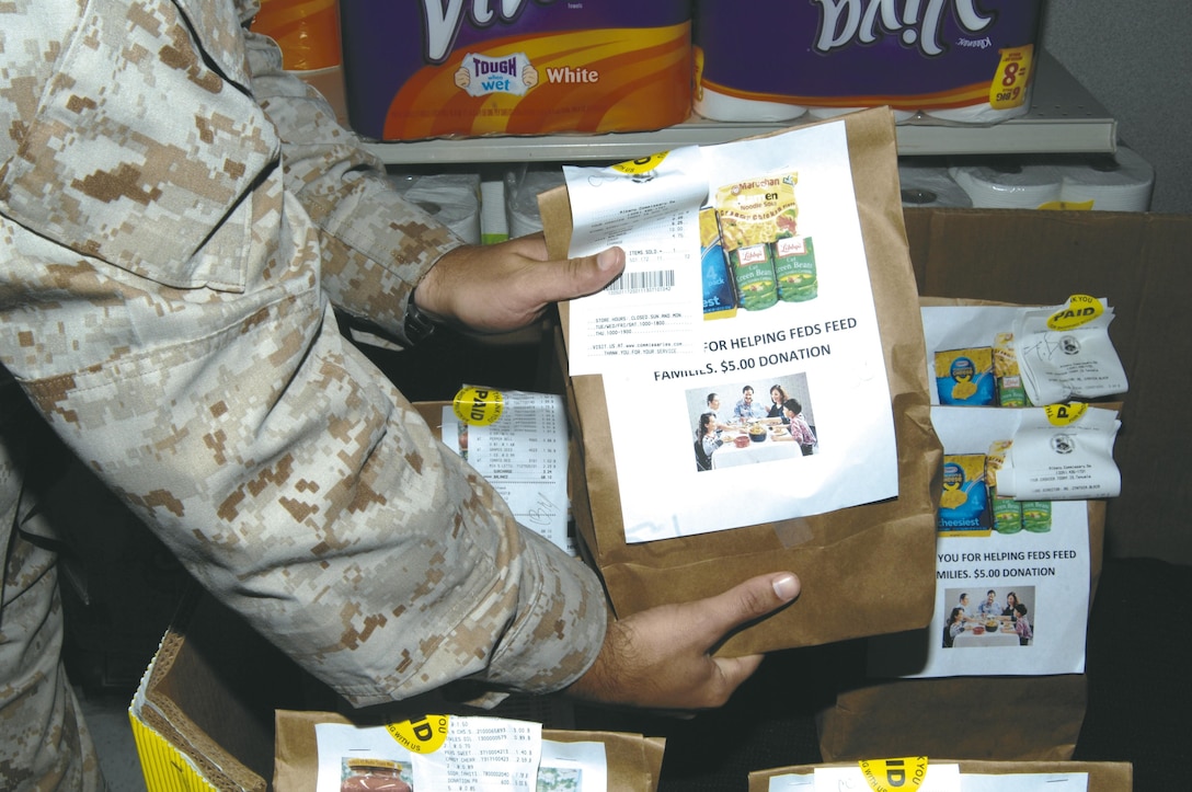 The 5th annual Feds Feed Families food drive campaign is underway here at the Commissary. The program, which runs through Aug. 31,  helps provide food and other goods to local families in need.
