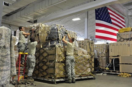 Airmen from the 621st Contingency Response Wing at Joint Base McGuire-Dix-Lakehurst, N.J., prepare emergency equipment for immediate response to Hurricane Irene at the CRW's Global Reach Deployment Center here Aug. 25. The roughly 600 Airmen of the CRW specialize in creating aerial port and command-and-control facilities in damaged or hostile environments. Previous missions have included humanitarian responses to Haiti, Pakistan and Japan in the aftermath of earthquakes, floods and tsunami in addition to Hurricanes Ike, Rita, Gustav and Katrina. 

