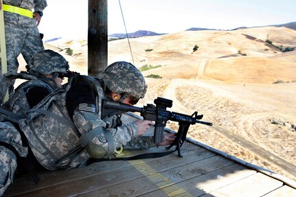 A competitor tests his shooting skills in "Warrior Challenge," the Armed Forces' first reality video program.