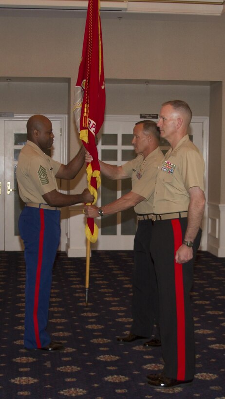 Lieutenant Gen. Robert E. Milstead, Jr., relinquished command of Marine Corps Recruiting Command during a change of command ceremony at the Clubs at Quantico, July 12. Following his acceptance of the colors from Sgt. Maj. Michael A. Logan, Milstead passed the colors to Maj. Gen. Mark A. Brilakis, who accepted command of MCRC.