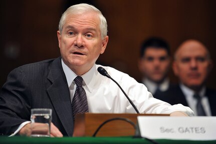 Secretary of Defense Robert M. Gates testifies before the Senate Armed Services Committee in Washington, D.C., Jan. 27, 2009. Secretary Gates wore his jacket halfway on due to surgery on his arm last week.