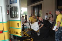 The last remaining inpatients at Walter Reed Army Medical Center are transferred by ambulance to the National Naval Medical Center, Bethesda. The transfer time was changed from the original time due to the approaching effects of Hurricane Irene. More than 100 inpatients moved from Walter Reed's wards to Bethesda and the flag was lowered for good at the 102-year-old Army hospital. The changes to military health care facilities in the national capital region was mandated by the Base Realignment and Closure Act of 2005.