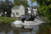 Maryland National Guard soldiers from units across the state, seen here Aug. 28, worked around the clock to provide critical support to civilian law enforcement and firefighting agencies in Salisbury, Md., during Hurricane Irene. (U.S. Army photo by Maj. Rick Breitenfeldt) 