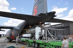 A U.S. Forest Service Modular Airborne Fire Fighting System II (MAFFS II) unit is loaded on to an Air Force Reserve Command C-130 Sept. 9 at Peterson Air Force Base, Colo. in preparation for support of aerial firefighting missions in Texas. Four Air Reserve Component MAFFS-equipped C-130s and crews have been tasked by U.S. Northern Command in support of the National Interagency Fire Center to supplement wildland firefighting efforts in Texas. Two C-130s from the 302nd Airlift Wing, stationed at Peterson AFB, Colo. and two C-130s from the 145th Airlift Wing of the North Carolina Air National Guard will deploy to Austin, Texas. 

