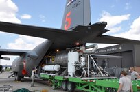 A U.S. Forest Service Modular Airborne Fire Fighting System II (MAFFS II) unit is loaded on to an Air Force Reserve Command C-130 Sept. 9 at Peterson Air Force Base, Colo. in preparation for support of aerial firefighting missions in Texas. Four Air Reserve Component MAFFS-equipped C-130s and crews have been tasked by U.S. Northern Command in support of the National Interagency Fire Center to supplement wildland firefighting efforts in Texas. Two C-130s from the 302nd Airlift Wing, stationed at Peterson AFB, Colo. and two C-130s from the 145th Airlift Wing of the North Carolina Air National Guard will deploy to Austin, Texas. 

