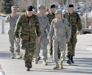 Army Gen. Charles H. Jacoby, Jr., NORAD and USNORTHCOM commander, and General Harald Sunde, Norwegian Chief of Defense Staff, talk as they begin a tour of NORAD and USNORTHCOM headquarters Feb. 13. Sunde, the Norwegian equivalent of the U.S. Chairman of the Joint Chiefs of Staff, is visiting to conduct talks to NORAD and USNORTHCOM leadership. During his visit, he received tours of the NORAD and USNORTHCOM Command Center and the Cheyenne Mountain complex. 

