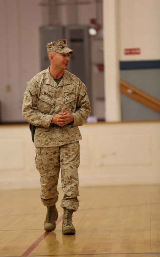 Lt. Col. Matthew A. Dumenigo, the newly appointed commanding officer of Combat Logistics Battalion 24, Combat Logistics Regiment 27, 2nd Marine Logistics Group, addresses friends and loved ones during a change of command ceremony aboard Camp Lejeune, N.C., July 12, 2013. Dumenigo assumed command after serving as regimental executive officer for three years and said he was excited for this opportunity. (U.S. Marine Corps photo by Lance Cpl. Shawn Valosin)