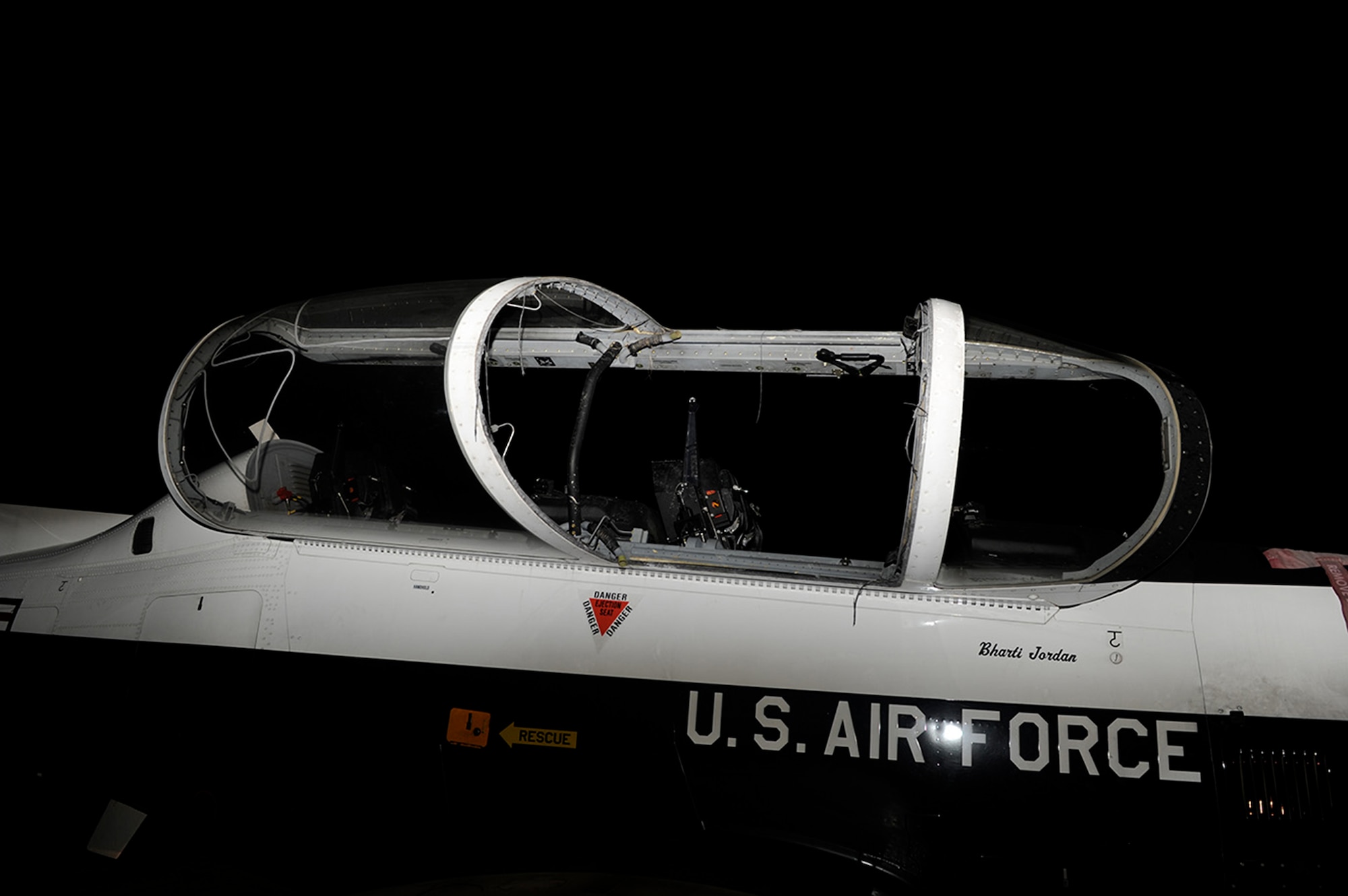 The canopy glass shattered when the canopy fracturing system was inadvertently activated by the student pilot during a touch-and-go landing. (USAF Photo)