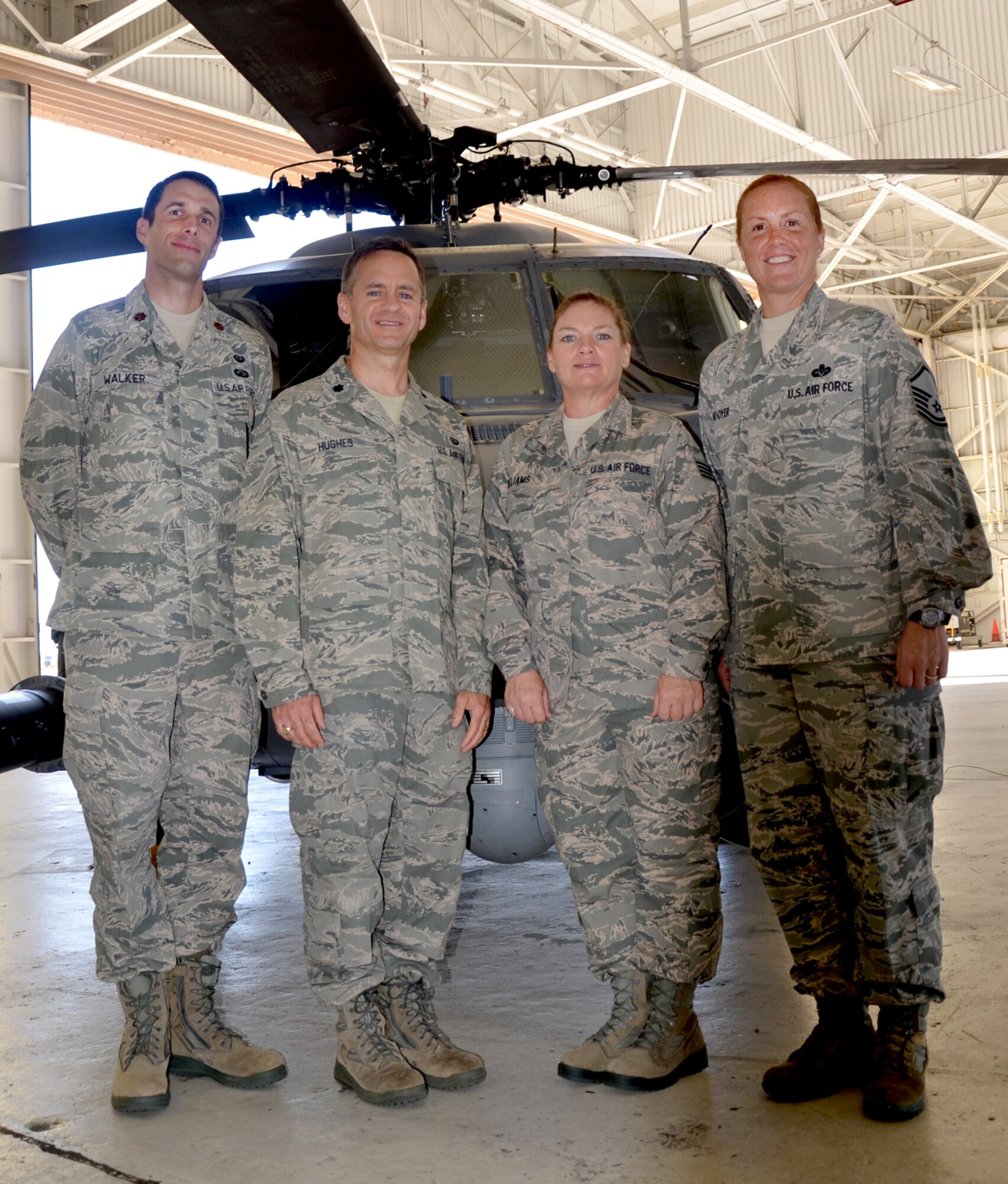 The 920th Rescue Wing's Judge Advocate Team at Patrick Air Force Base, Fla., is available during unit training assemblies to advice and provide a range of legal services to Reserve Airmen. From left to right, they are: Lt. Col. Tim Hughes (JAG Chief), Maj. Johnny Walker, Staff Sgt. Laura Williams and Master Sgt. Buffy Kooyer. 