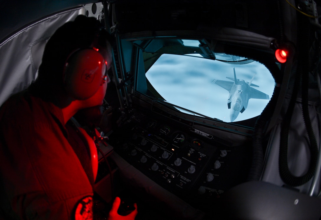 Senior Airman Travis Burnett, 91st Air Refueling Squadron boom operator trains on MacDill Air Force Base’s new KC-135 Stratotanker Boom Operator Weapon System Trainer, July 12, 2013. The BOWST is a fully-simulated, large-scale procedural trainer for aerial refueling with replicated aircraft systems, controls, and functions within a complete aircrew boom compartment. (U.S. Air Force Photo by Staff Sgt. Brandon Shapiro/Released)  