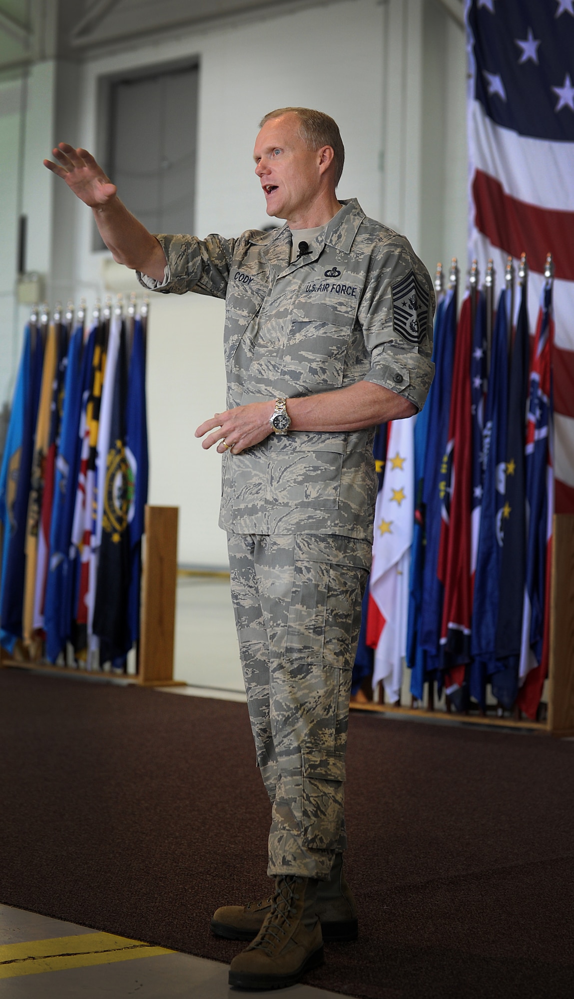 Chief Master Sgt. of the Air Force, James Cody speaks at an all call for Airmen from Minot Air Force Base, N.D., July 12, 2013. Cody touched on the topics of financial aid, the future of the enlisted performance report system and the importance of the wingman concept as it applies to the daily lives of Airmen. (U.S. Air Force photo/ Airman 1st Class Stephanie Ashley)