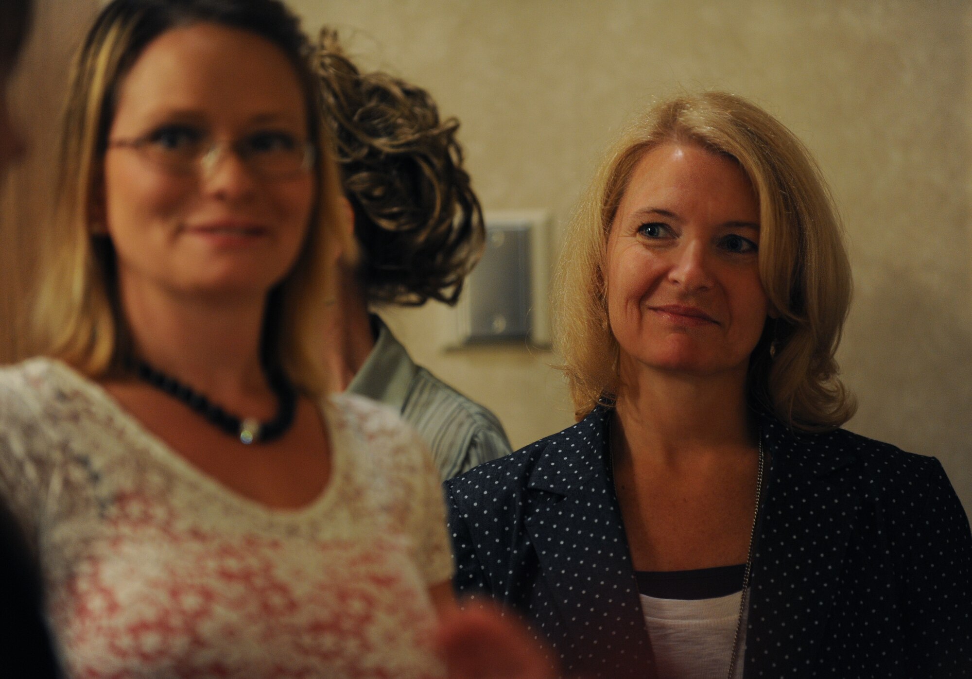 Athena Cody, spouse of Chief Master Sgt. of the Air Force, James Cody, speaks with the Key Spouses and Enlisted Spouses groups at Minot Air Force Base, N.D., July 12, 2013. Mrs. Cody talked with members of both groups about possible methods of increasing membership and also getting necessary assistance to spouses of military personnel who are new to the base. (U.S. Air Force photo/ Airman 1st Class Stephanie Ashley)