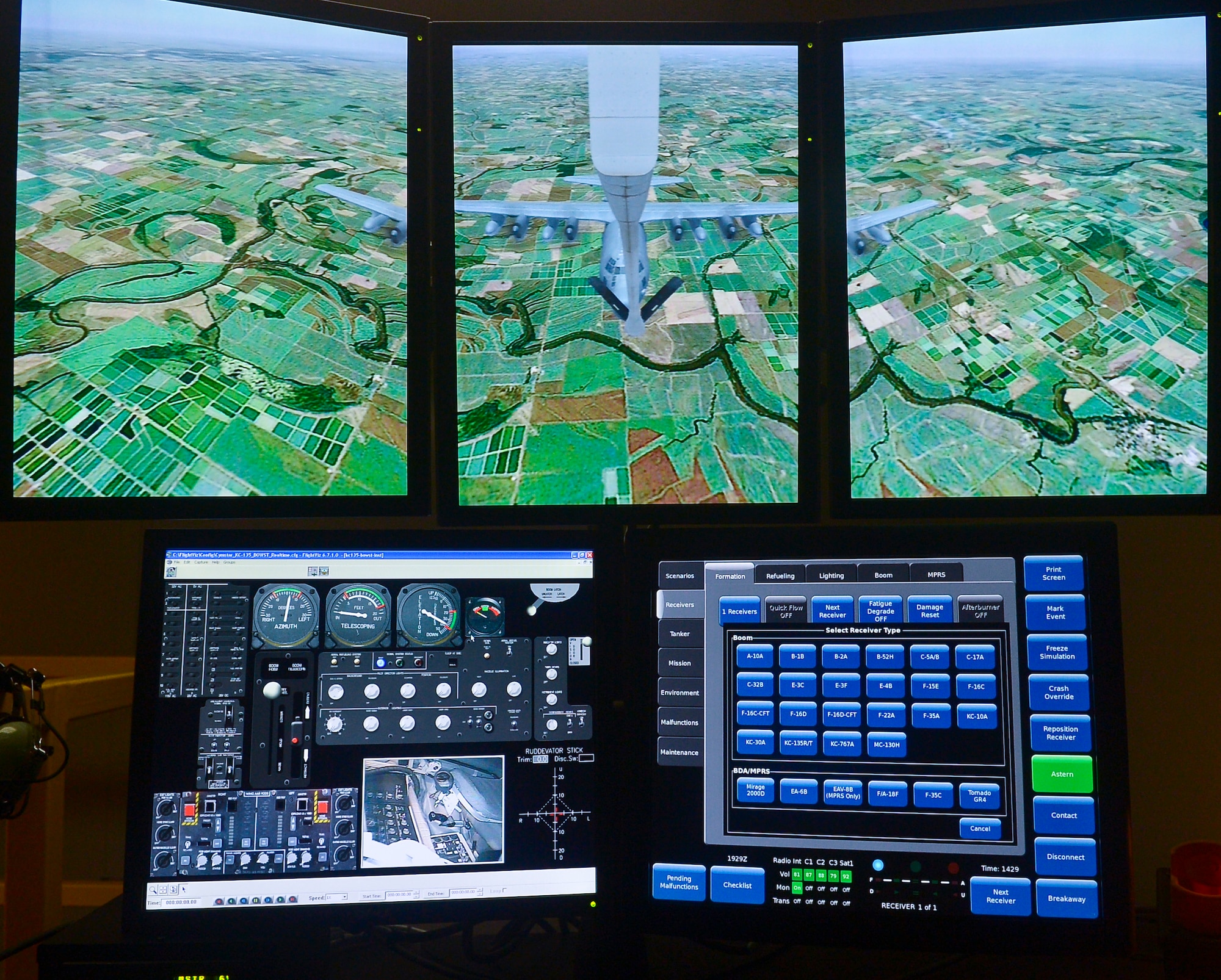 A series of computer screens make it possible for Boom Operator Weapon System Training instructors to view trainee progress, select weather conditions and aircraft, display geographical locations and much more. The realistic nature of the simulator is one of the distinguishing factors that make the BOWST such an integral training tool. (U.S. Air Force Photo by Staff. Sgt. Brandon Shapiro/Released)(Cropped)