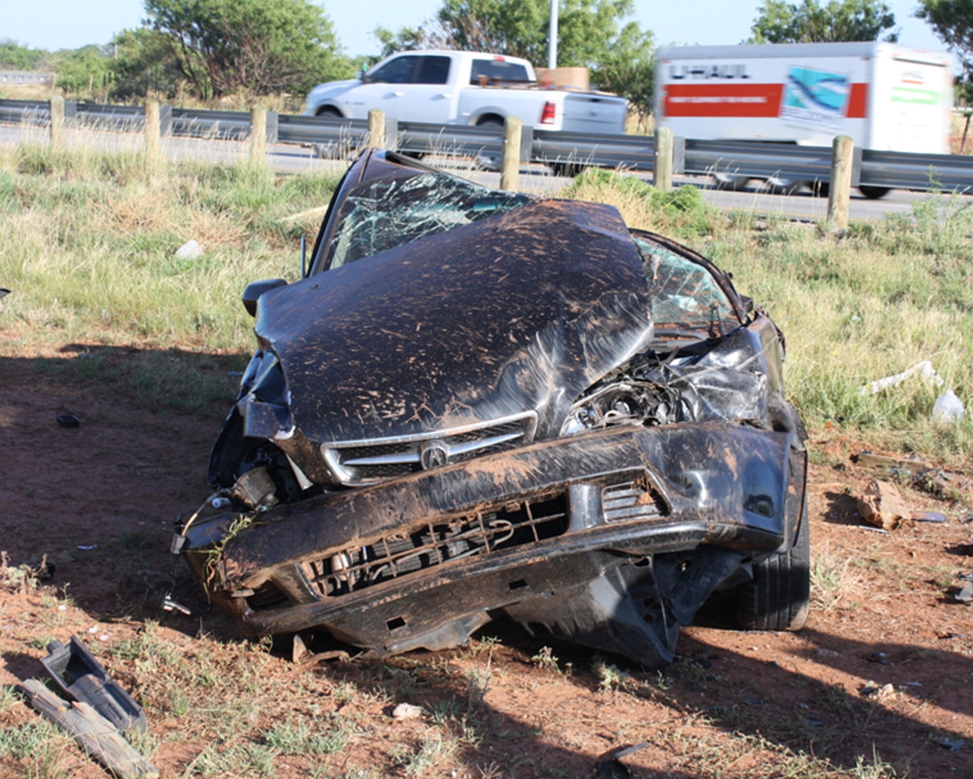 Senior Airman Daniel Mejia, 9th Bomb Squadron intelligence analyst, was one of the first to respond to a vehicle accident June 11, 2013, in Abilene, Texas. The driver hit a guardrail rolling the vehicle off to the side of the road. Mejia was on his way to work when he saw the car and provided self aid buddy care until an ambulance arrived. (Courtesy photo)