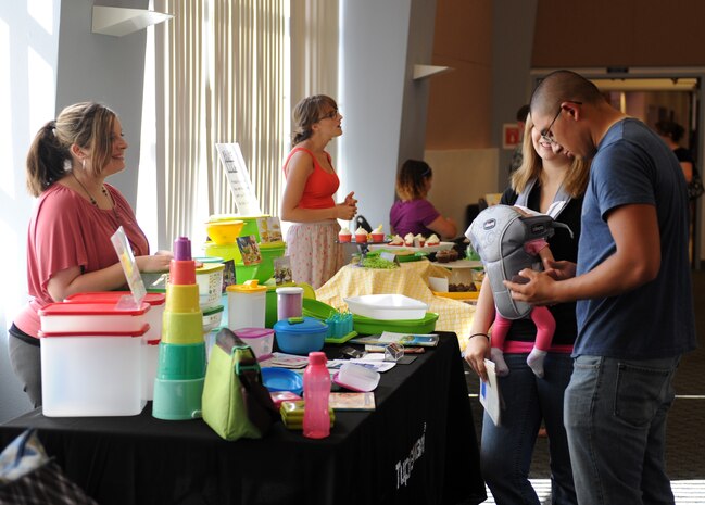Members of Team Beale browse through the Vendor Fair held at the Community Activity Center here July 11, 2013. The 9th Force Support Squadron with the support of the CAC have a Vendor Fair twice a year. (U.S. Air Force photo by Staff Sgt. Robert M. Trujillo/ Released)