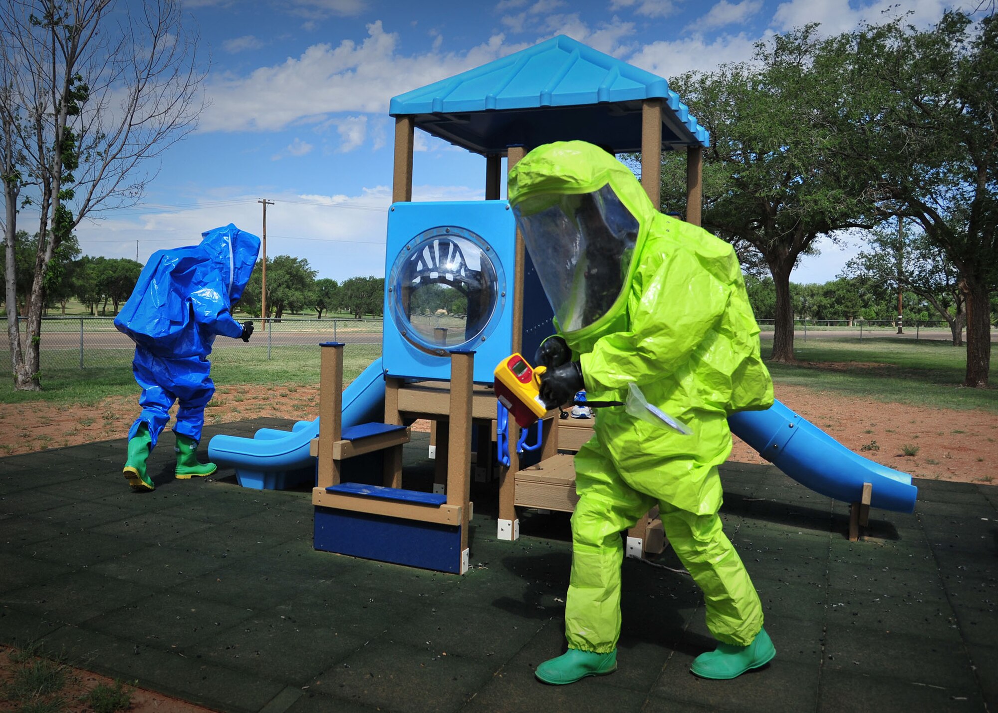 U.S. Air Force Air Commandos test an area during the HAZMAT Responder Olympics July 12, 2013, at Cannon Air Force Base, N.M. The joint training competition pulled participants from Bioenvironmental Engineering, Emergency Management and Fire Protection and challenged them in several scenarios covering Chemical, Biological, Radiological and Nuclear incidents. (U.S. Air Force photo/Senior Airman Alexxis Pons Abascal) 