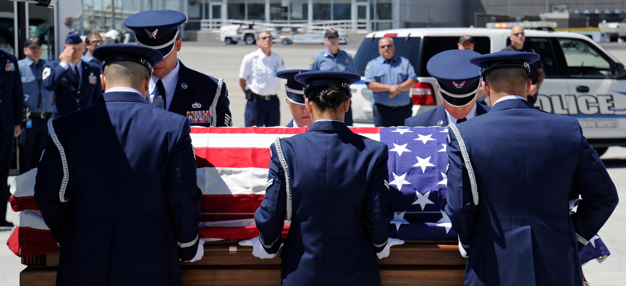 Fairchild’s Honor Guard lifts the remains of Maj. Larry Hanley into the hearse at the Spokane International Airport in Spokane, Wash., July 11, 2013. Hanley’s remains were discovered on Feb. 24, 2012, in Laos after his aircraft went down during the Vietnam War in 1969. He now returns home after 44 years. (U.S.  Air Force photo by Airman 1st Class Ryan Zeski/Released) 