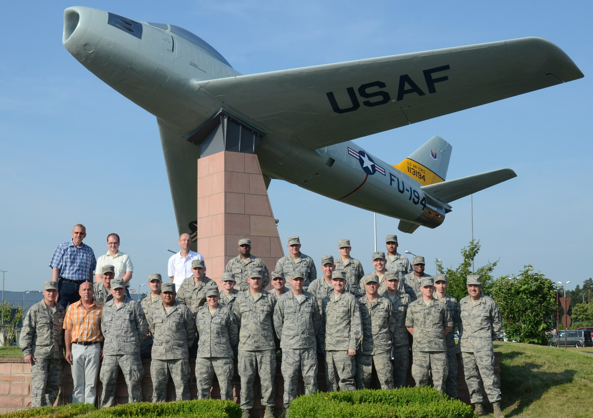 Airmen who worked on displaying the F-86 Sabre static pose for a photo in front of the jet July 9, 2013, Ramstein Air Base, Germany. The F-86 is an American fighter jet that was assigned to the 86th Fighter-Bomber Wing in 1953.  


Airmen from left to right:

1st Row: Brig. Gen. Patrick Mordente, Thomas Wazulin, Tech. Sgt. Todd Bosley, Senior Airman Michael Jarnegan, Tech. Sgt. Stephanie Echols, Senior Airman Nicholas Gerard, Tech. Sgt. Michael Rhodes, Staff Sgt. Nathan Tinsley, Tech. Sgt. Nathaniel Steinmetz, Staff Sgt. Austin Schierberg, Tech. Sgt. Michael Denapoli, Senior Airman Sean Green, Chief Master Sgt. Morris

2nd Row: Master Sgt. Stephen Feathers, Staff Sgt. Dwayne Coffee, Staff Sgt. James Hartung, Airman 1st Class Nicholas Shadowens, Maj. Michael Thompson, Senior Airman Wade Miller, 1st Lt. Tyler Gross, Airman 1st Class Samuel Nelson

3rd Row: Harald Hollinger, Michael Klingel, Gerhard Gehm, Tech Sgt. Sean Williams, Airman 1st Class Zachary Bowles, Airman 1st Class Fernando Munoz-Balderas, Senior Airman Ian Gonzalez 


(U.S. Air Force photo / 1st Lt. Kay M. Nissen)
