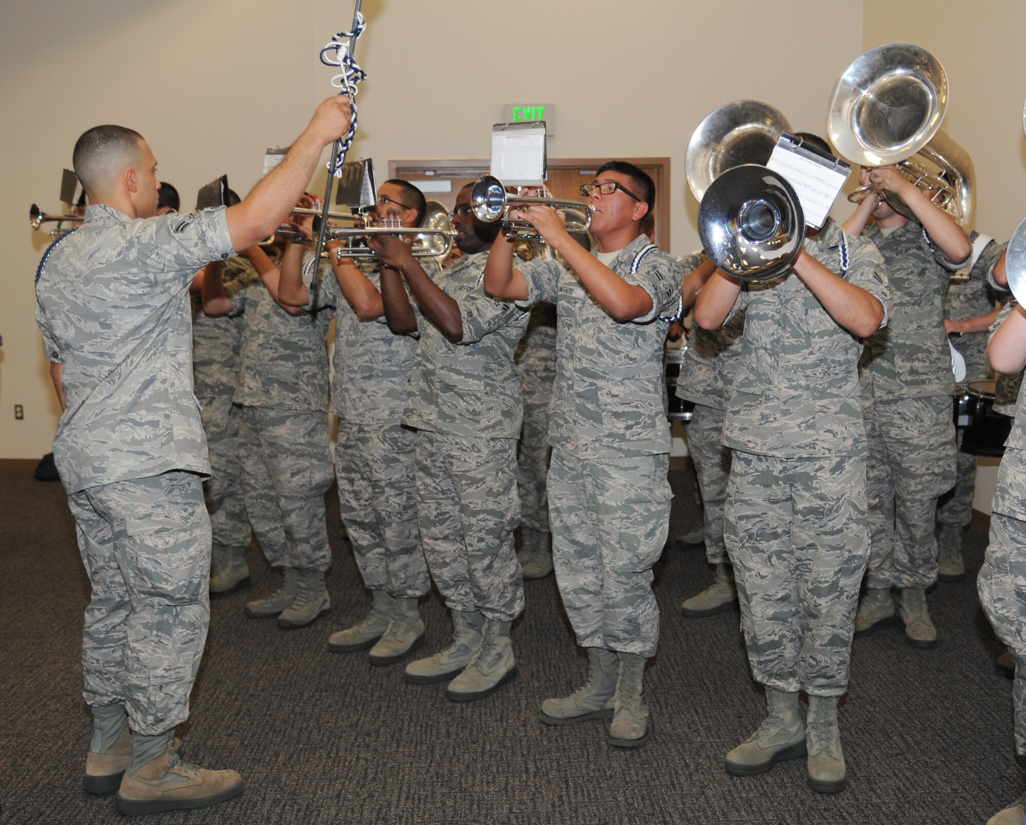 The Blue Knight Drum and Bugle Corp. performed the Air Force song immediately following the 81st Training Group change of command ceremony July 11, 2013, at the Roberts Consolidated Aircraft Maintenance Facility, Keesler Air Force Base, Miss.  Brig. Gen. Brad Spacy, 81st Training Wing commander, was the officiating officer for the event as the command was passed from Col. Maureen Smith, outgoing 81st TRG commander, to Col. George Tombe, incoming 81st TRG commander.