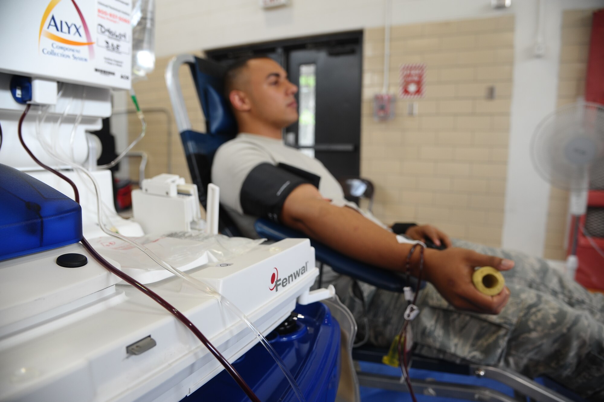 Airman 1st Class Cirrez Miller, 14th Medical Operations Squadron, waits patiently while donating blood at the Independence Day Blood Drive July 3 at the Fitness Center.  Due to the increased demand for blood during the summer months, event officials were hoping to obtain 100 units of blood. 