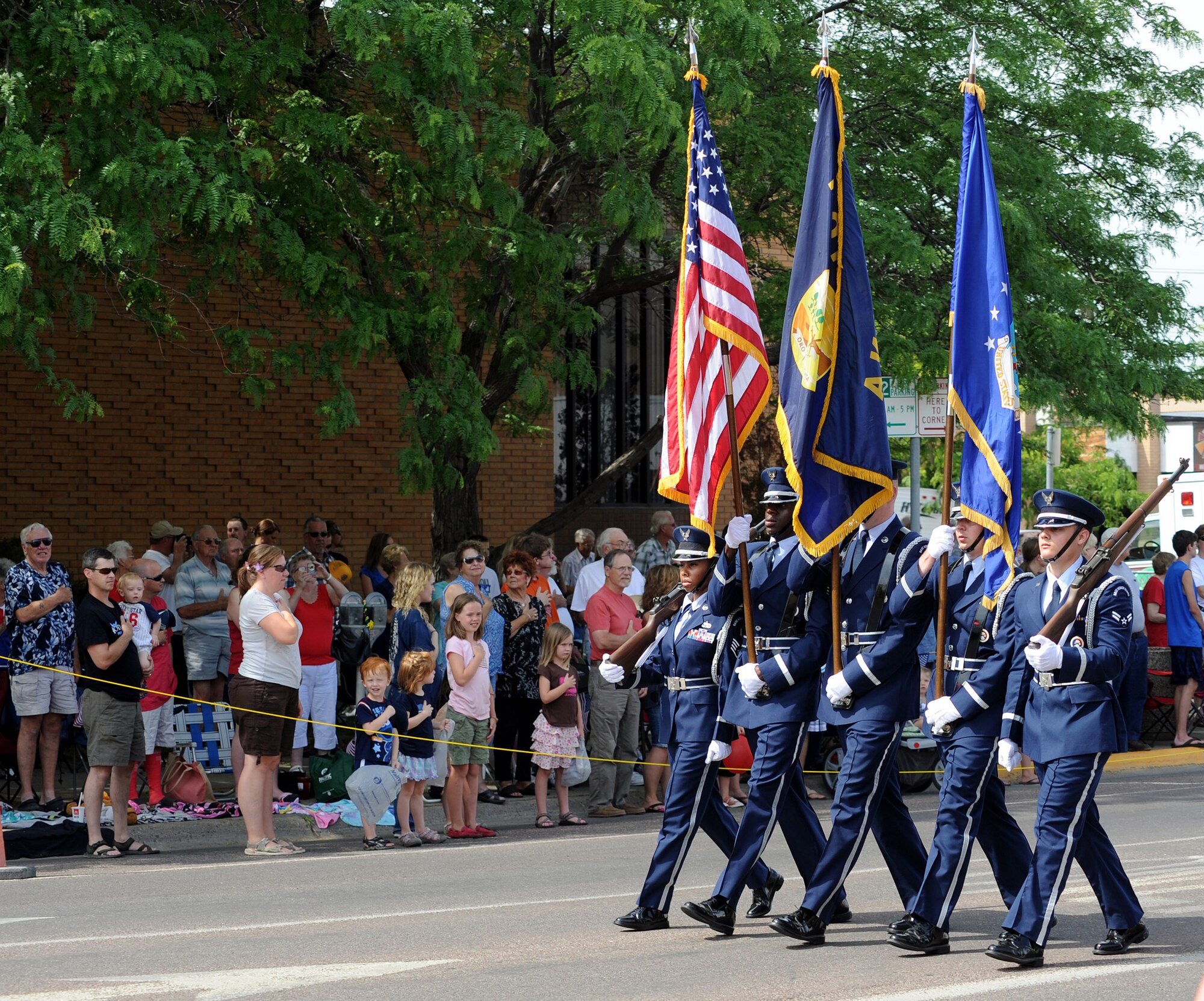 Malmstrom Air Force Base Honor Guard members march in the Great Falls, Mont., Independence Day Parade. Col. Robert Stanley, 341st Missile Wing commander, and members from the Montana National Guard were also featured in the parade. (U.S. Air Force photo/Staff Sgt. R.J. Biermann)