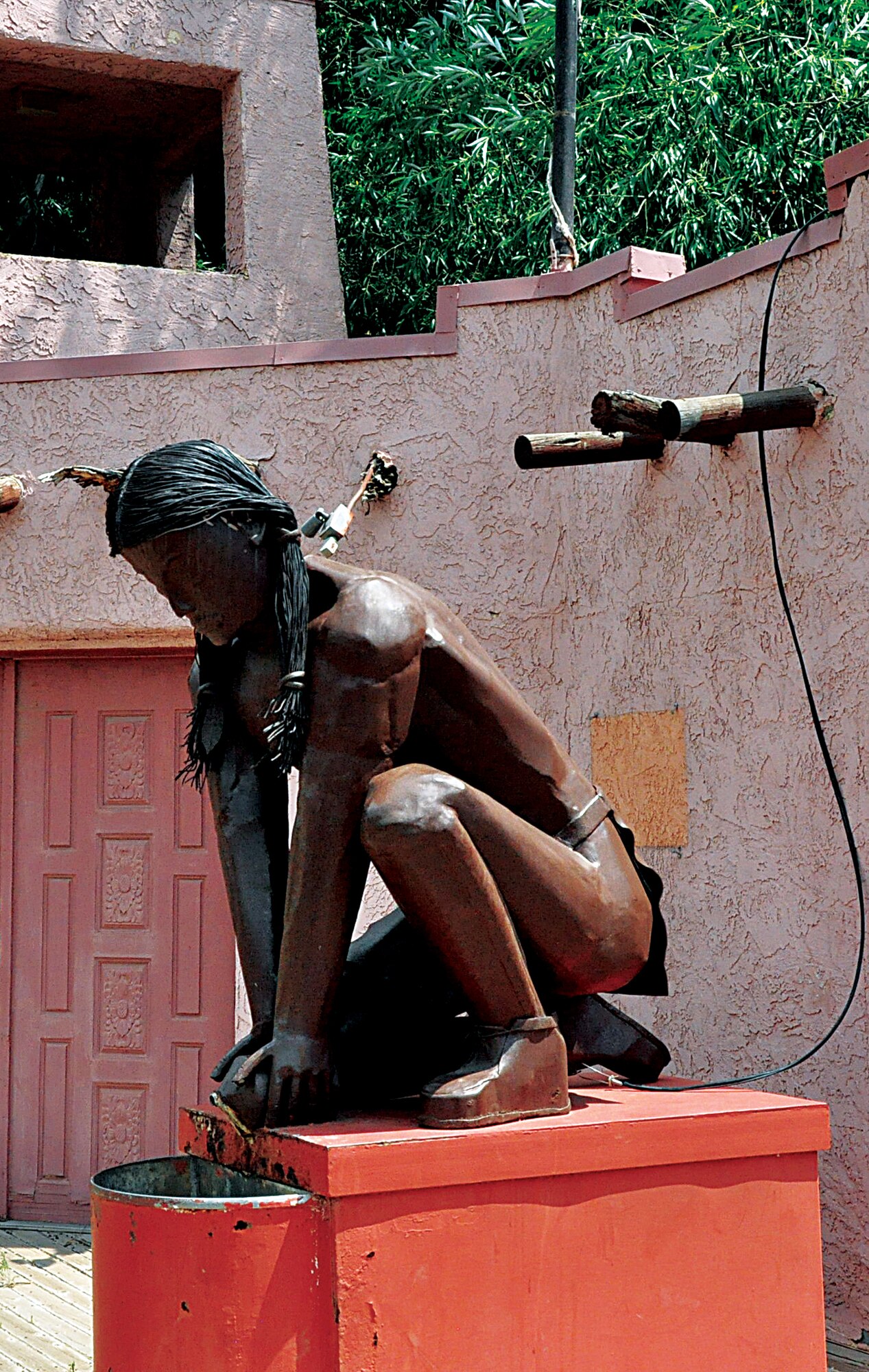 A statue/fountain of a Ute appears to pour mineral water into a basin. This statue is one of several statues/fountains throughout Manitou Springs, Colo. (U.S. Air Force photo by Airman 1st Class Brandon Valle) 