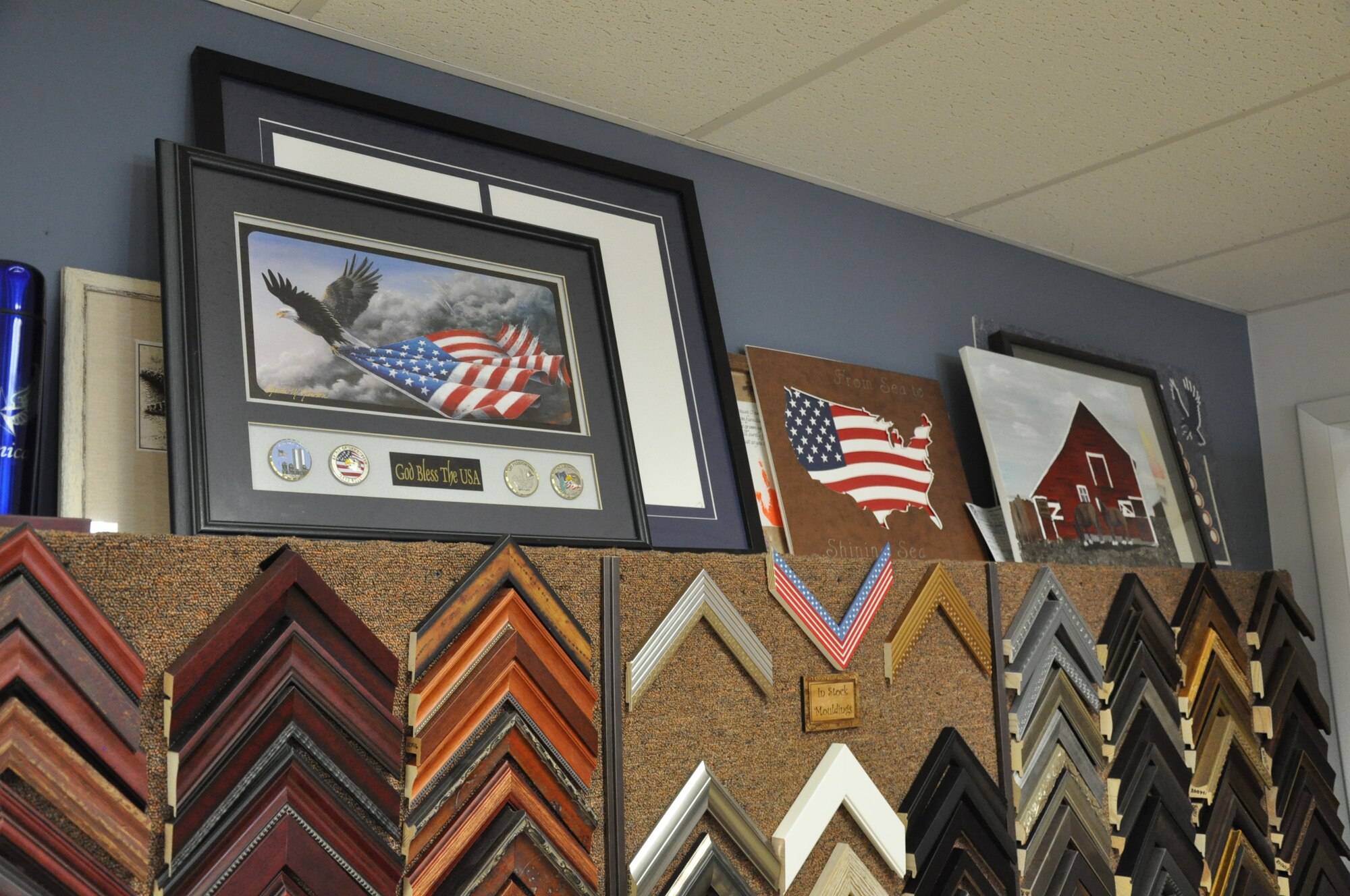 A collection of framing projects going on in the custom framing shop on base. The framing shop can frame any project, from the classic frame to a full mat cut. (U.S. Air Force by Airman 1st Class Brandon Valle)