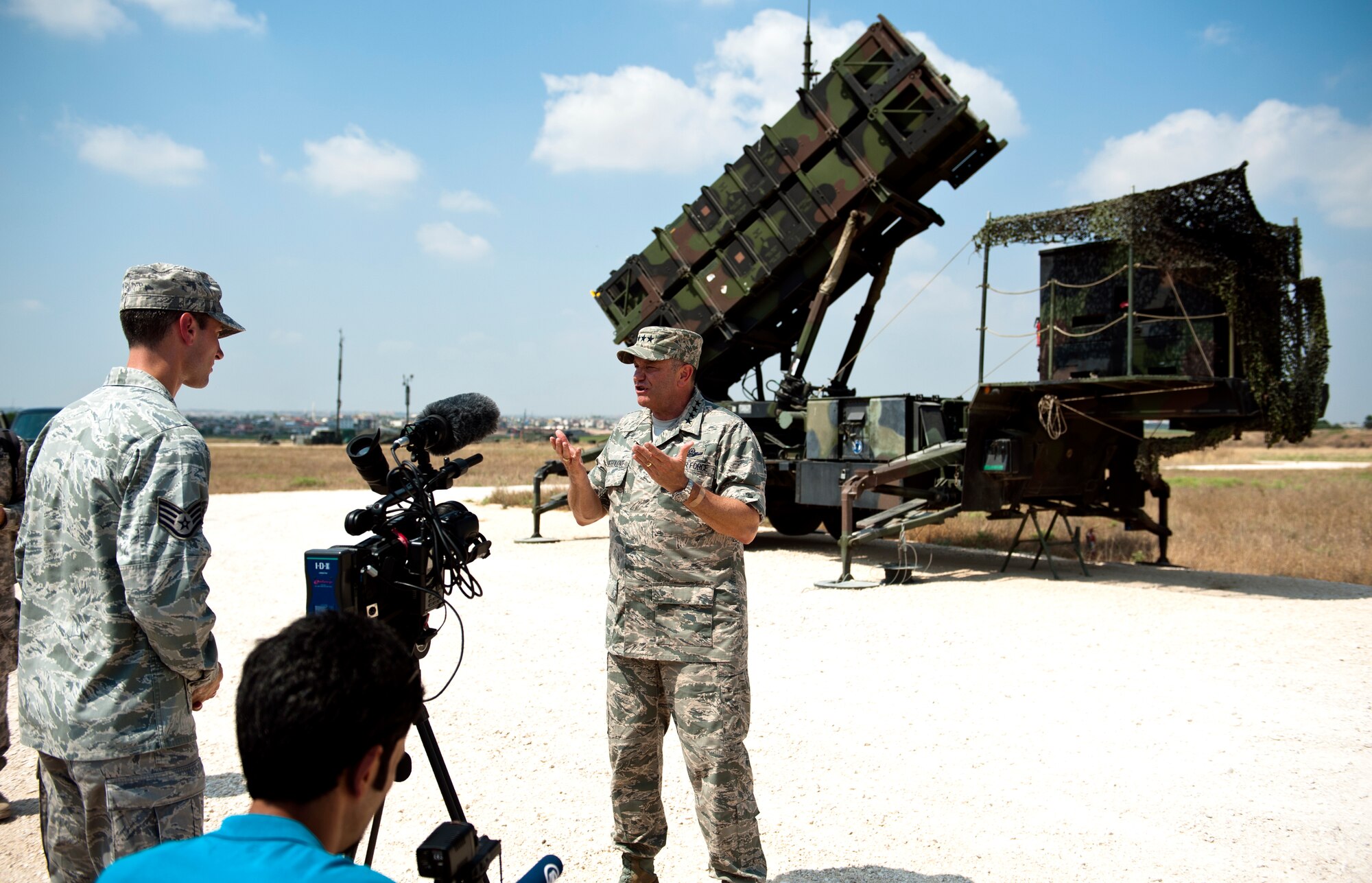 U.S. Air Force Gen. Philip Breedlove, NATO Supreme Allied Commander Europe, holds an interview with Staff Sgt. Brad Kasch, Armed Forces Network broadcaster, and members of local Turkish media in front of a Dutch Patriot missile launching station July 11, 2013. Breedlove met with U.S. Forces, NATO Allies and local Turkish media during his immersion tour at Incirlik AB. (U.S. Air Force photo by Senior Airman Daniel Phelps/Released)