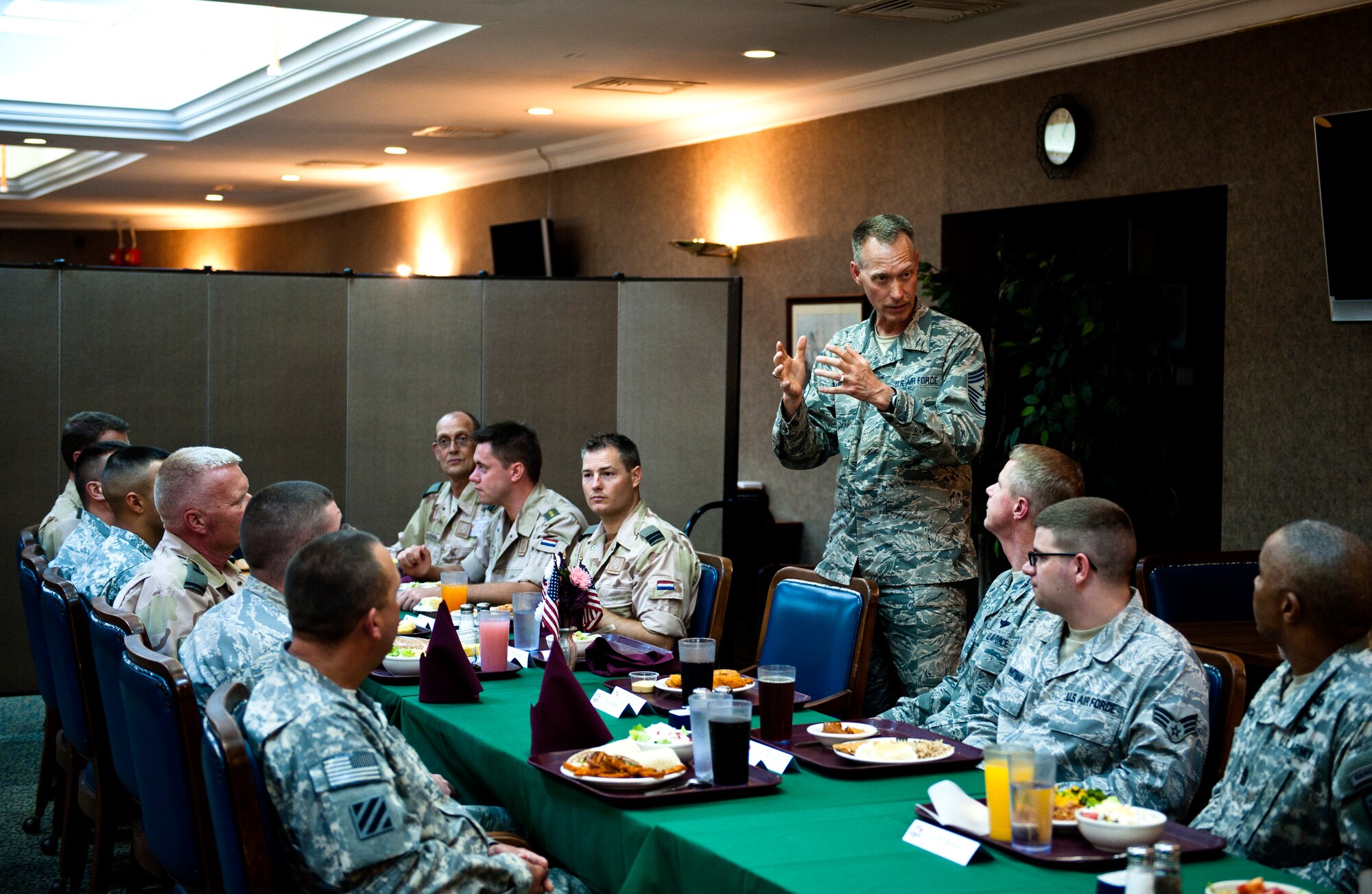 U.S. Air Force Chief Master Sgt. Richard Small, Supreme Headquarters Allied Powers Europe command chief, speaks with U.S Forces and NATO Allies during a luncheon July 11, 2013, at Incirlik Air Base, Turkey. NATO servicemembers had the opportunity to ask SHAPE leadership questions about issues that concerned them during the luncheon. (U.S. Air Force photo by Senior Airman Daniel Phelps/Released)