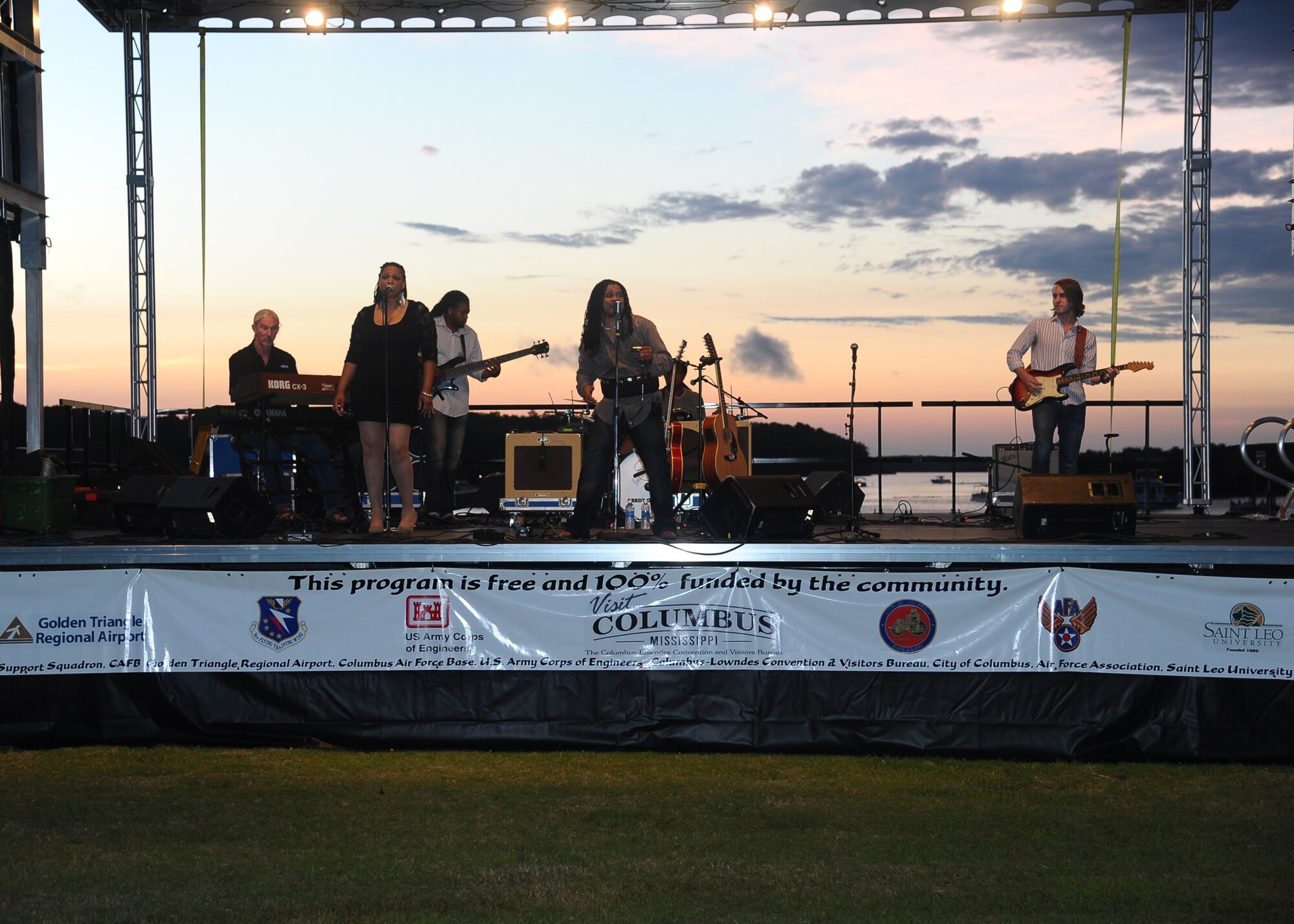 Blues artist Grady Champion performs live in front of a crowd at the Fireworks on the Water event July 4 at the Stennis Lock and Dam. Champion is a native of Canton, Miss. and kicked off the show after the T-6 Texan flyover. (U.S. Air Force Photo/ Airman 1st Class Stephanie Englar)