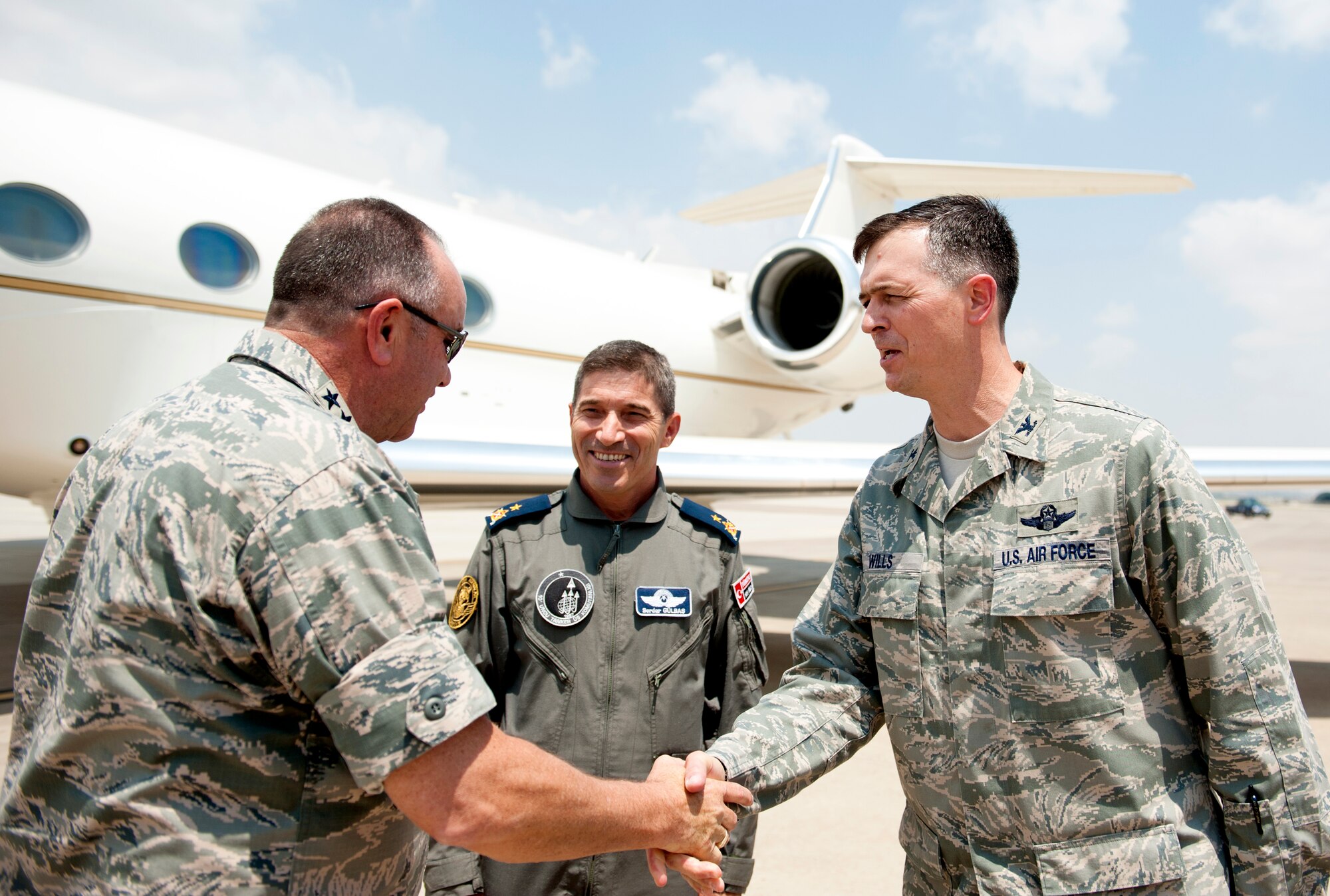 U.S. Air Force Gen. Philip Breedlove, NATO Supreme Allied Commander Europe, greets U.S. Air Force Col. Craig Wills, 39th Air Base Wing commander, and Turkish air force Brig. Gen. Serdar Gulbas, 10th Tanker Base commander, during a visit to Incirlik Air Base, Turkey, July 11, 2013. Breedlove visited Incirlik AB to meet with U.S. forces and NATO allies to explain his vision for the region. (U.S. Air Force by Senior Airman Daniel Phelps/Released)