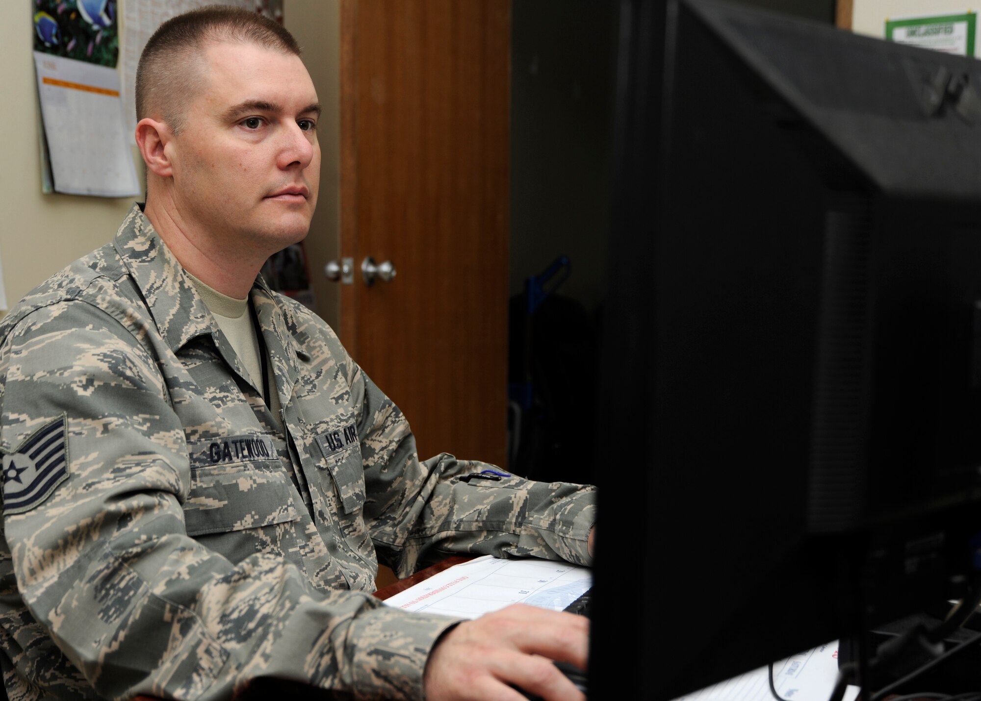 Tech. Sgt. Scott Gatewood, 387th Expeditionary Support Squadron, is the noncommissioned officer in charge of Personnel Support for Contingency Operations.  He is on his first deployment from his home station, Hill Air Force Base, Utah.  Gatewood comes from a long military lineage, so knew he was destined for military service.  Gatewood is this week's Rock Solid Warrior.  (U.S. Air Force photo by Master Sgt. Chris Campbell) 