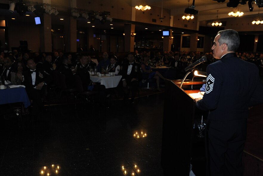 U.S. Air Force Chief Master Sgt. Ramon Colon-Lopez, 18th Wing command chief, gives a speech about the importance of becoming a senior NCO at the senior NCO induction ceremony on Kadena Air Base, Japan, July 9, 2013. This ceremony celebrates those who were selected to put on the rank of master sergeant. (U.S. Air Force photo by Airman 1st Class Keith A. James/Released)