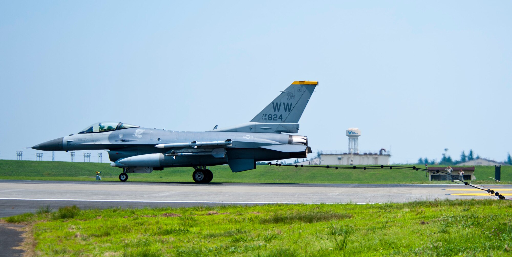 YOKOTA AIR BASE, Japan – An F-16 Fighting Falcon successfully hooks onto the arresting cable for the testing of emergency landing system at Yokota Air Base, Japan, July 10, 2013.  The testing is completed annually to certify Yokota’s emergency landing system.  Two F-16’s from Misawa Air Base, Japan, assisted with testing the system.  (U.S. Air Force photo by Airman 1st Class Soo C. Kim)