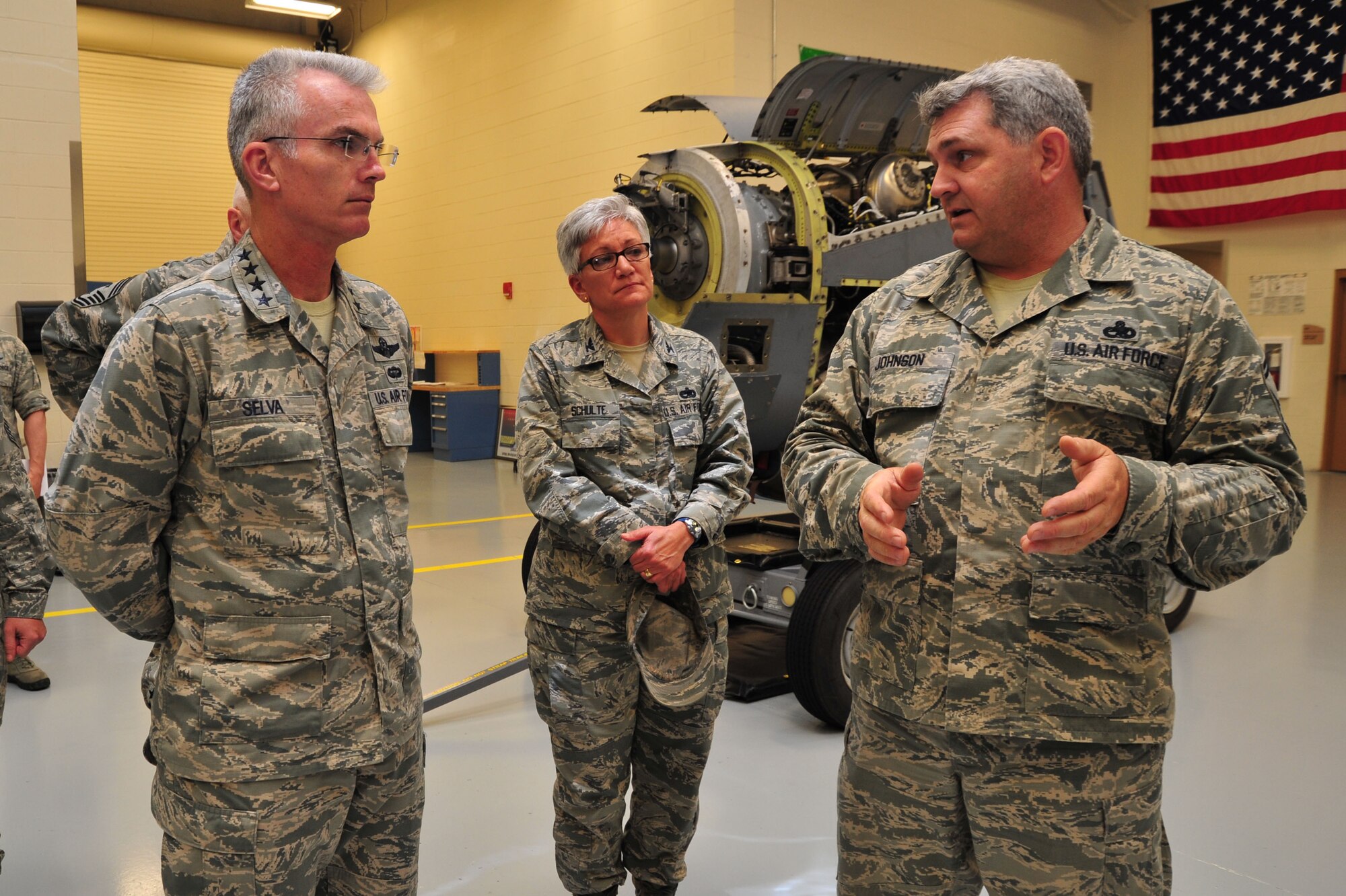 Gen. Paul Selva, commander of Air Mobility Command, receives a briefing on C-130J engine and propeller maintenance from Senior Master Sgt. Eric Johnson, 403rd Maintenance Squadron propulsion flight chief, while touring the 403rd Wing Roberts Consolidated Aircraft Maintenance Facility at Keesler Air Force Base, Miss., May 15, 2013. While here, the general visited the 815th and 345th Airlift Squadrons and the 53rd Weather Reconnaissance Squadron, all units under the 403rd Wing, as well as the 81st Training Wing during his tour. (U.S. Air Force photo/Tech. Sgt. Ryan Labadens)