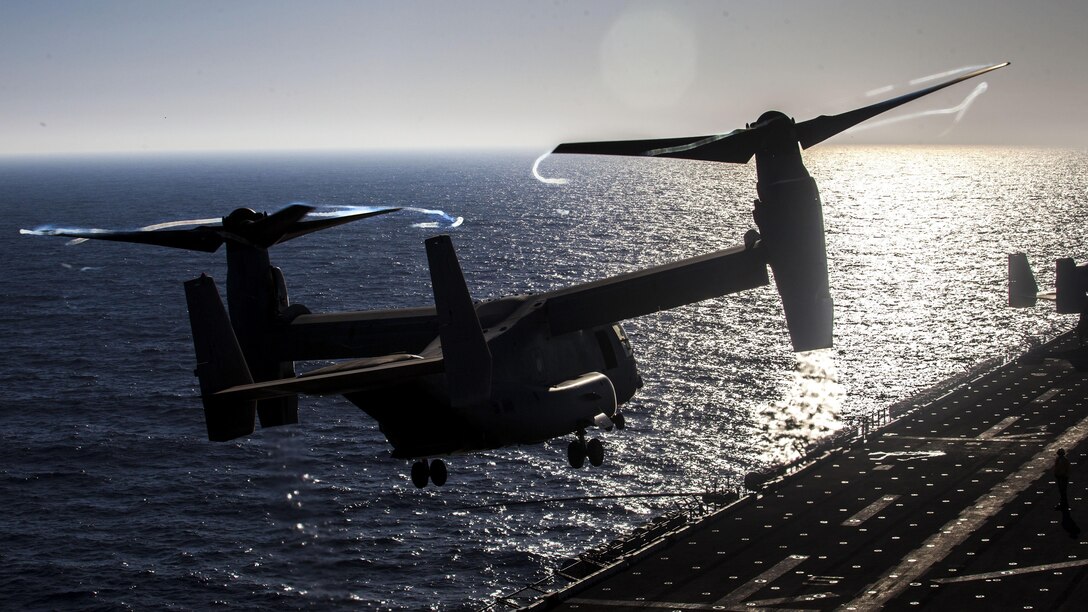A U.S. Marine Corps MV-22B Osprey assigned to Marine Medium Tiltrotor Squadron (VMM) 266 (Reinforced), 26th Marine Expeditionary Unit (MEU), takes off from the flight deck of the USS Kearsarge (LHD 3), at sea, July 13, 2013.  The 26th MEU is a Marine Air-Ground Task Force forward-deployed to the U.S. 5th Fleet area of responsibility aboard the Kearsarge Amphibious Ready Group serving as a sea-based, expeditionary crisis response force capable of conducting amphibious operations across the full  range of military operations. (U.S. Marine Corps photo by Sgt. Christopher Q. Stone/Released)