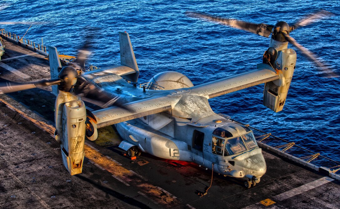 A U.S. Marine Corps MV-22B Osprey assigned to Marine Medium Tiltrotor Squadron (VMM) 266 (Reinforced), 26th Marine Expeditionary Unit (MEU), prepares to takeoff from the flight deck of the USS Kearsarge (LHD 3), at sea, July 13, 2013.  The 26th MEU is a Marine Air-Ground Task Force forward-deployed to the U.S. 5th Fleet area of responsibility aboard the Kearsarge Amphibious Ready Group serving as a sea-based, expeditionary crisis response force capable of conducting amphibious operations across the full  range of military operations. Images 130713-M-SO289-123, 130713-M-SO289-124 and 130713-M-SO289-125 were used to create the multi-layer HDR photo illustrations to correct exposure differences within the original imagery. No content has been changed or manipulated. (U.S. Marine Corps photo illustration by Sgt. Christopher Q. Stone/Released)