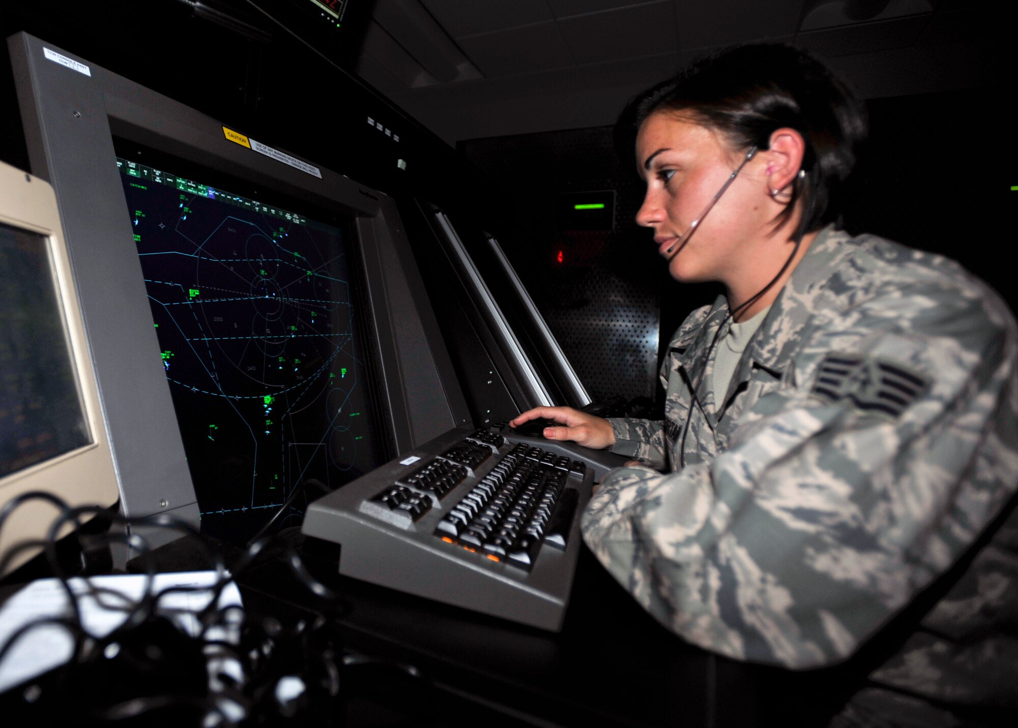 Staff Sgt. Samantha McCurtain, 51st Operations Support Squadron NCO in charge airfield automation manager, monitors a screen for sequencing aircraft at Osan Air Base, Republic of Korea, July 1, 2013. McCurtain is this week’s Airman Spotlight winner. (U.S. Air Force photo/Senior Airman Siuta B. Ika)