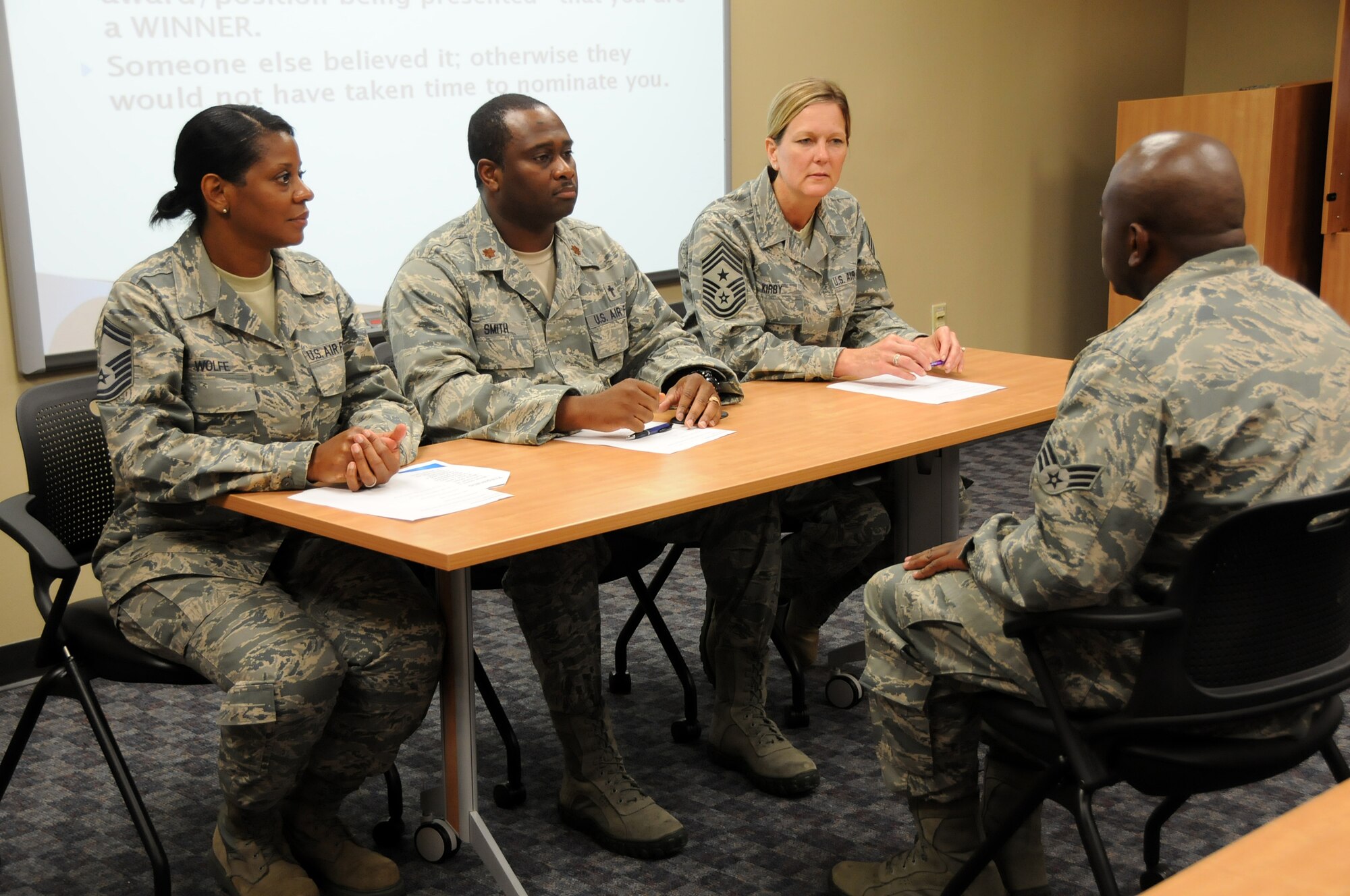 Air Guard members from the 192nd Fighter Wing had an opportunity to sharpen their interview skills by volunteering to practice in front of a mock interview board, July 13, 2013. The “Mock Interview Board” presented by the Junior Enlisted Council, briefed airmen on how to prepare for a board interview and the procedures to follow when meeting the board. (U.S. Air National Guard photo by Airman 1st Class Johnisa B. Roberts/Released)