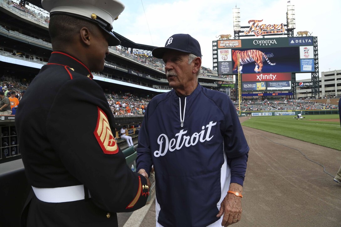Staff Sgt. Michael Milliner meets Jim Leyland, Detroit Tigers manager, 
at Comerica Park June 21. Milliner, a Detroit native, is a Marine Corps 
recruiter out of Recruiting Sub-Station Warren, Mich.
